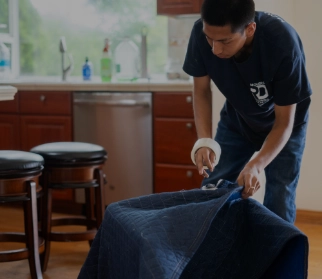 Movers packing an apartment