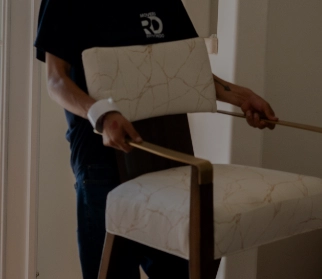 Movers moving a piano
