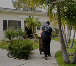 Movers moving a trolley